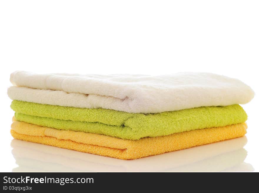 Colorful towels on a white background