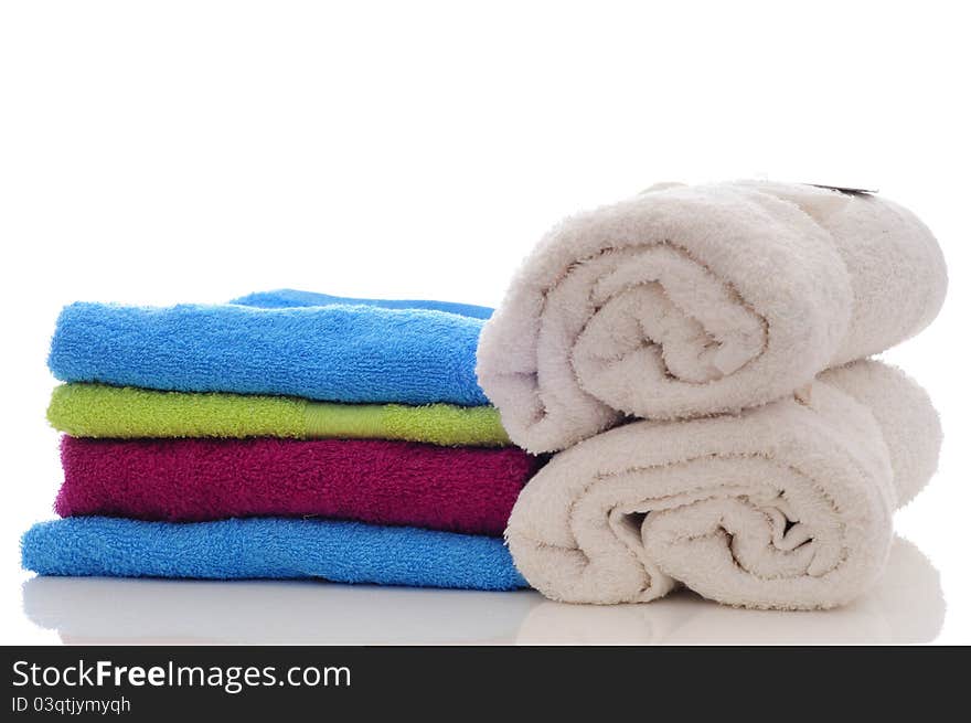 Colorful towels on a white background