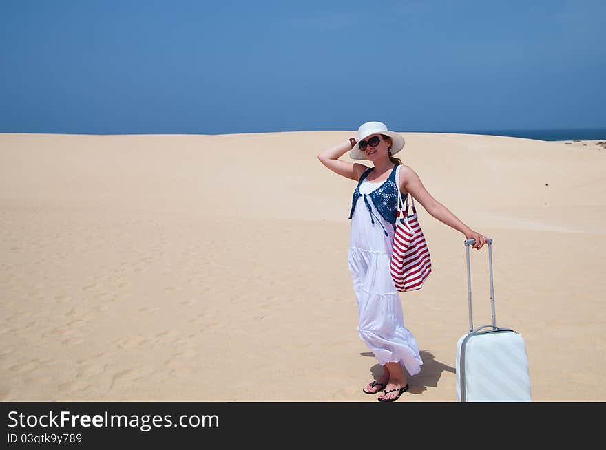 Happy woman with luggage