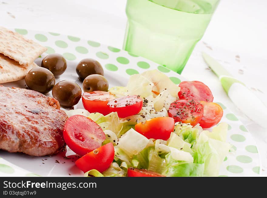 Lunch with fresh salad and meat