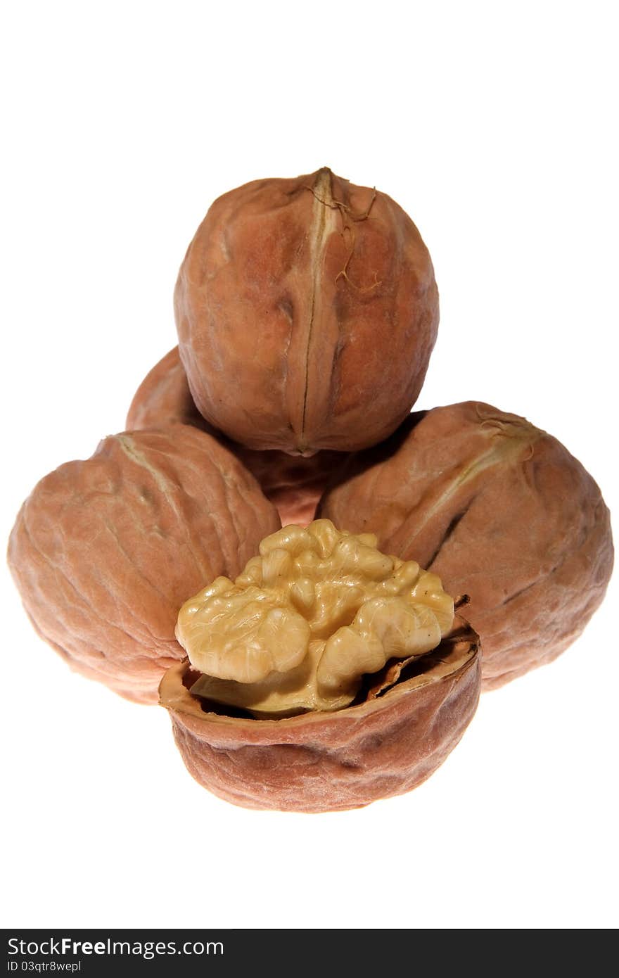 Group of walnuts on white