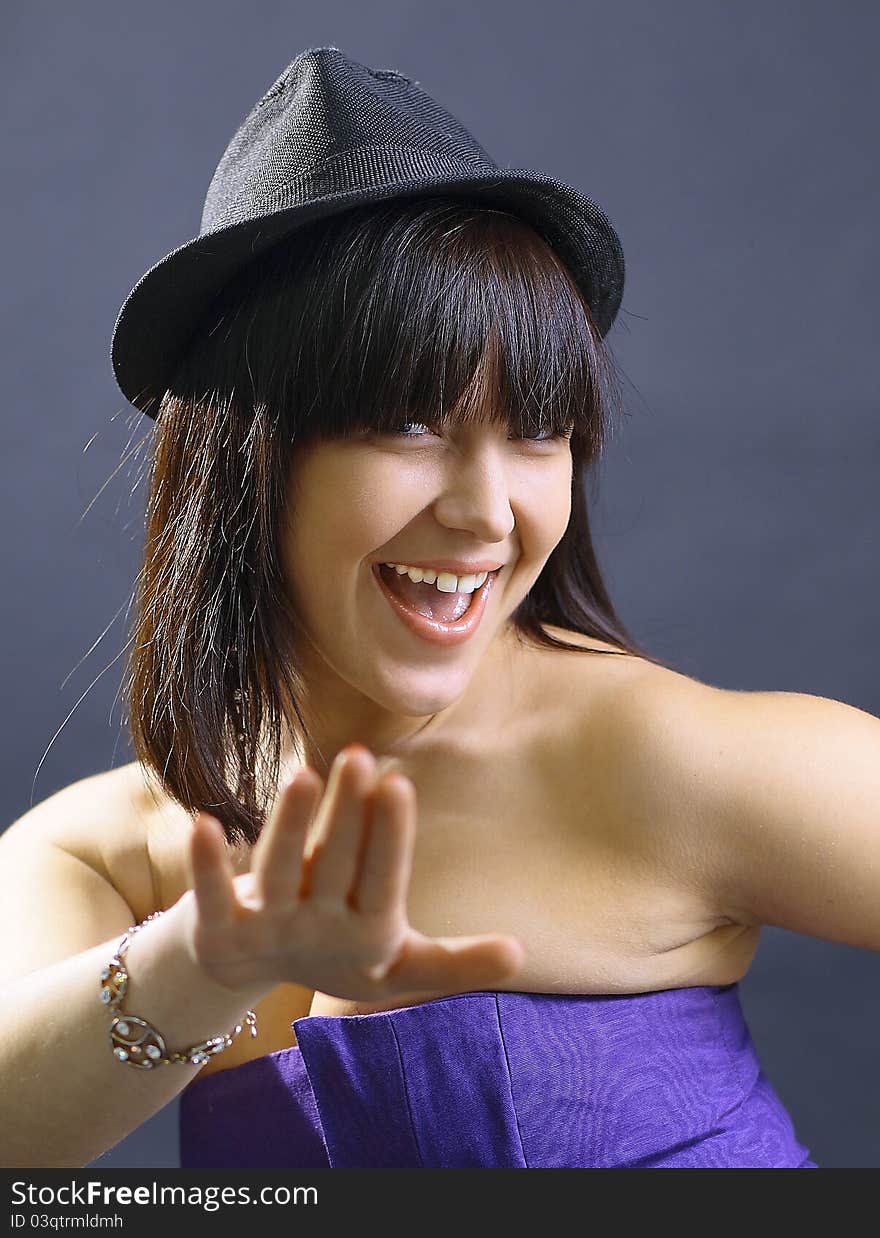 Portrait of a beautiful young sexy woman in hat