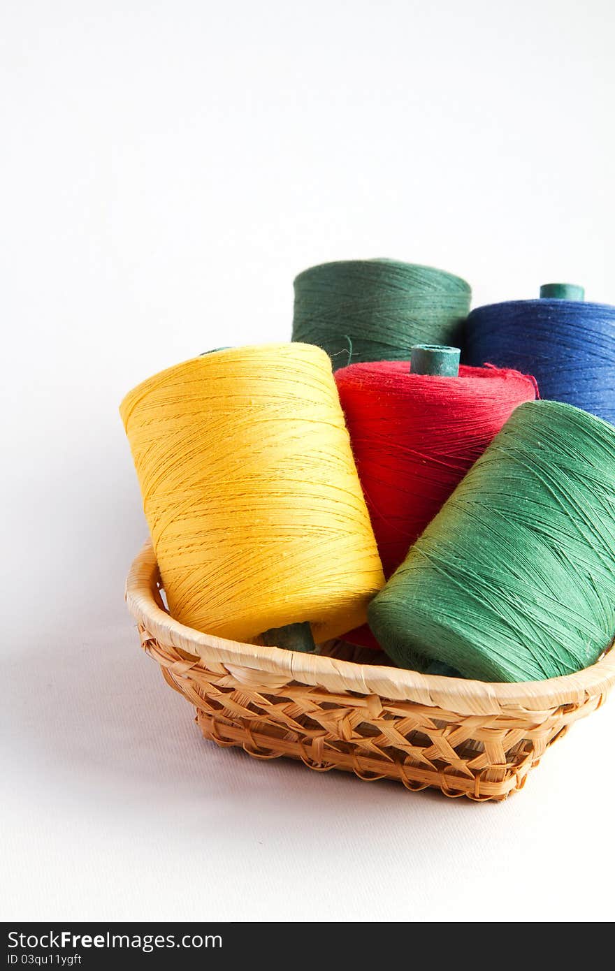 Five coils of threads on white background. Five coils of threads on white background