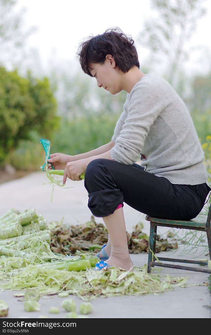 Chinea woman do some housework. Chinea woman do some housework