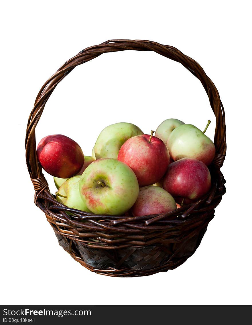 Basket of fresh red and green apples isolated on white background. Basket of fresh red and green apples isolated on white background