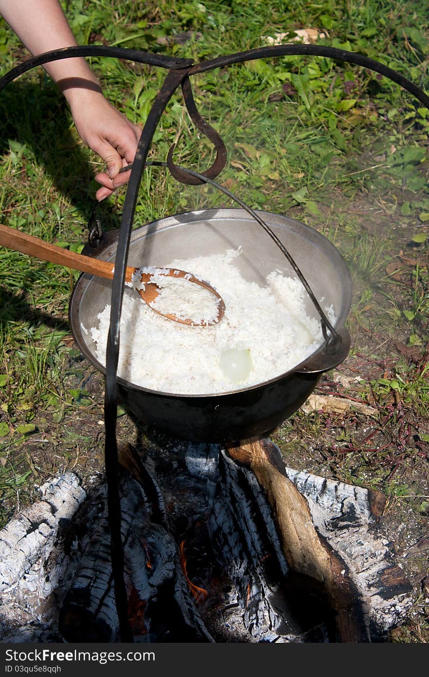 Prepared rice outdoor on fire on holiday of harvest