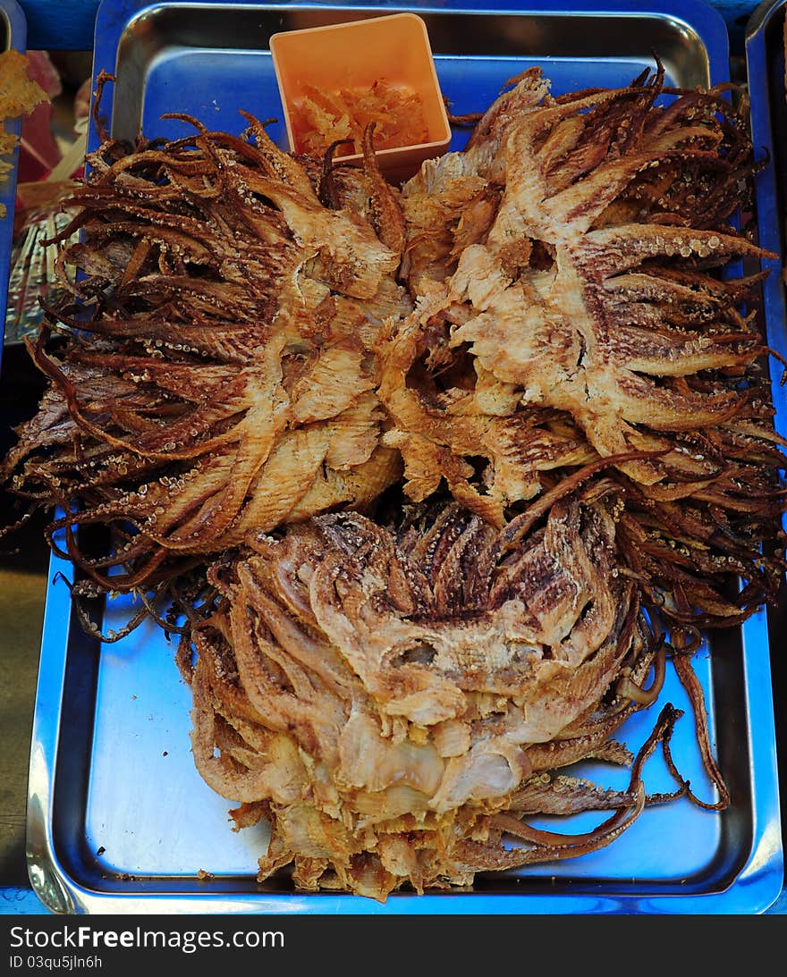 Fried octopus at a food market in Yehliu , taiwan