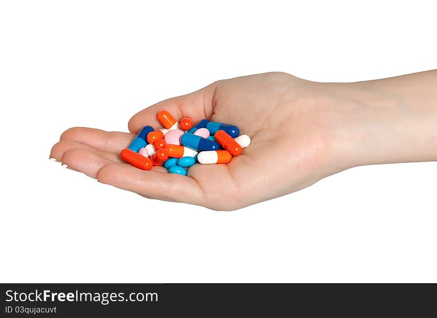 Isolated hand with medical pills. Isolated hand with medical pills