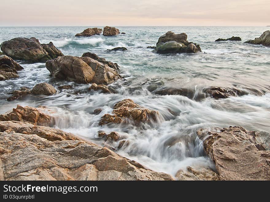 View of a piece of Costa Brava beach, in Platja d'Aro, Spain. View of a piece of Costa Brava beach, in Platja d'Aro, Spain.