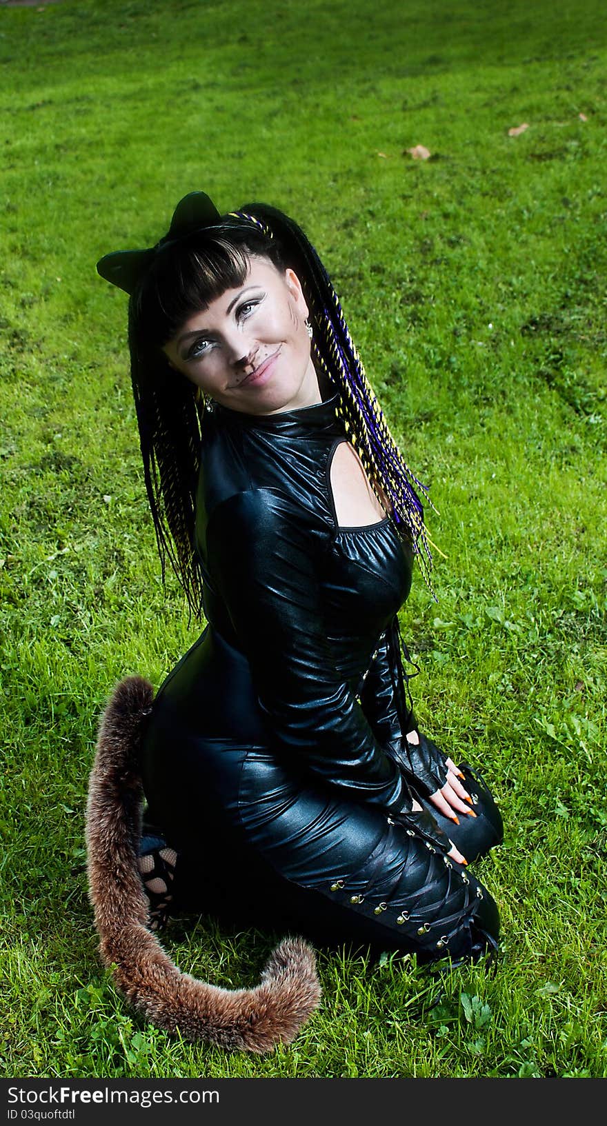 Cat Woman on the grass