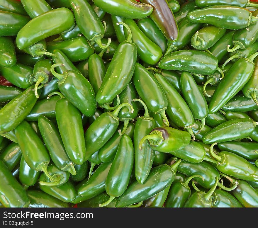 Green peppers for sale at a local farmers market