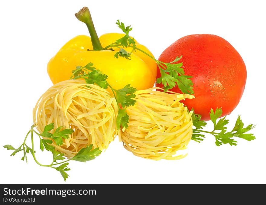 Raw pasta nest and ingredients - tomato, pepper and greens isolated. Raw pasta nest and ingredients - tomato, pepper and greens isolated