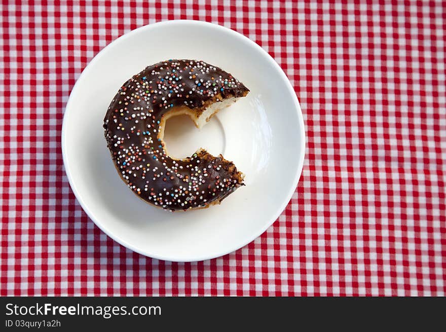 Cut donut on table