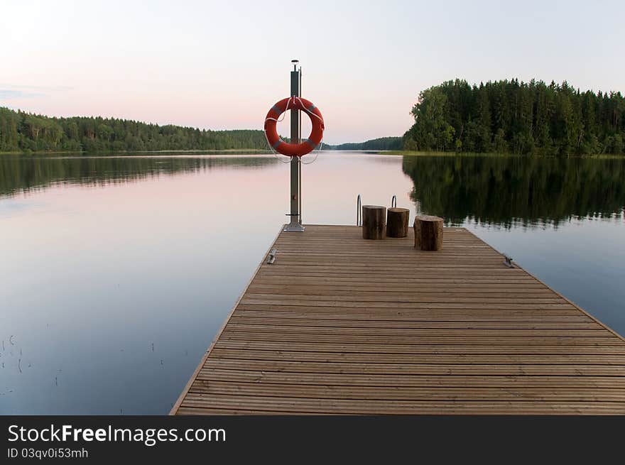 Pier on the lake. Summer evening. Pier on the lake. Summer evening