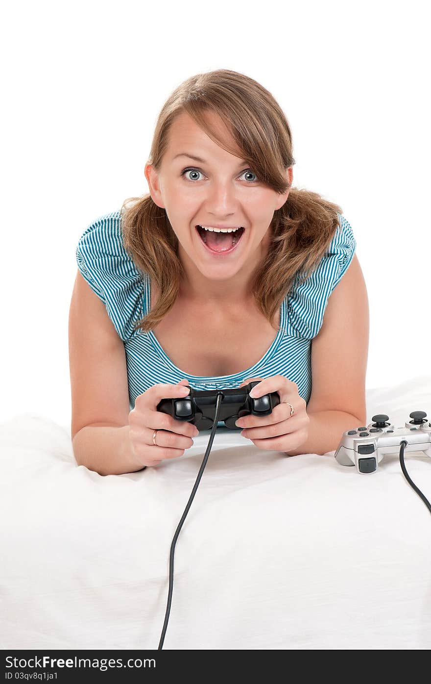 Happy young beautiful woman playing a video game. Happy young beautiful woman playing a video game