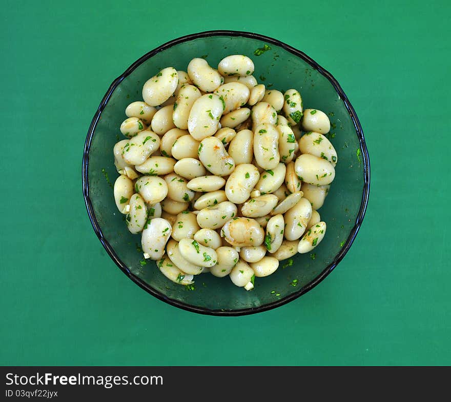 Source bean salad in the foreground takes study