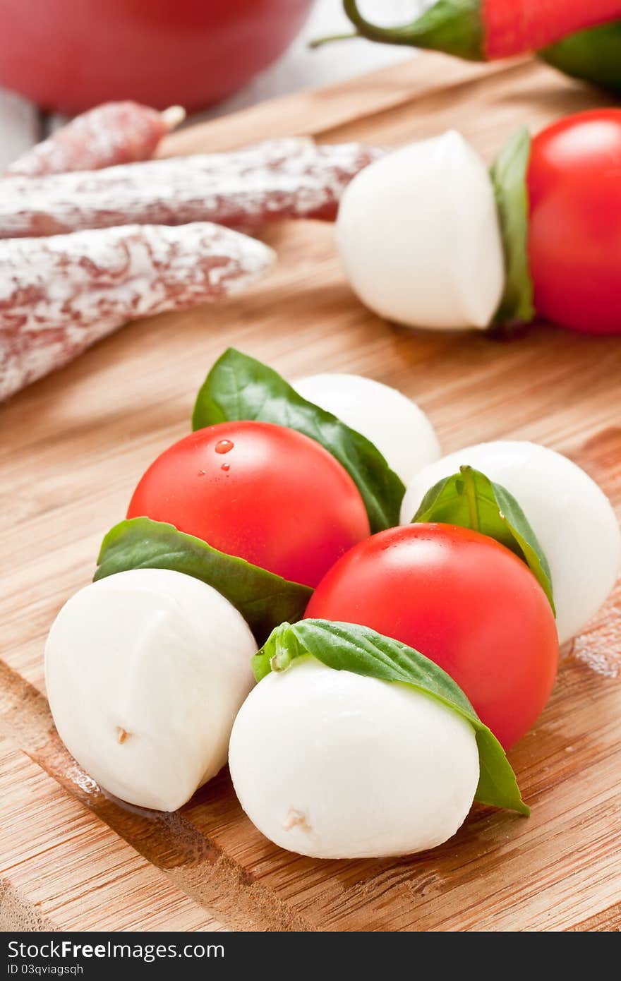 Mozzarella skewers with tomato and basil