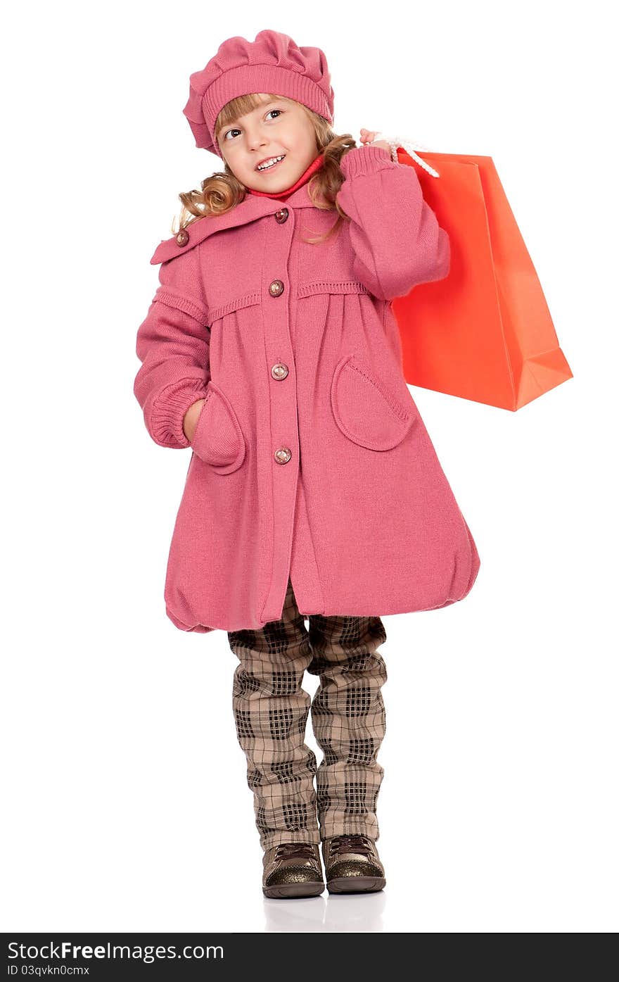 Portrait of a pretty little girl with bag. Isolated on white background.