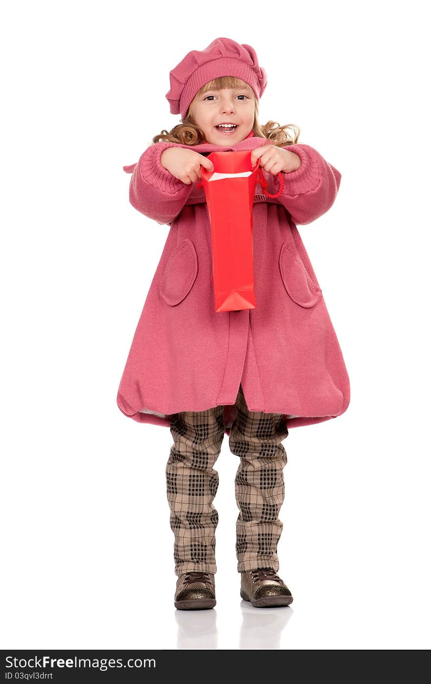 Portrait of a pretty little girl with bag. Isolated on white background.