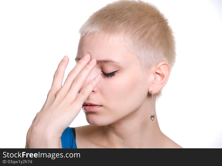 Portrait of the beautiful blonde with short hair isolated on white background