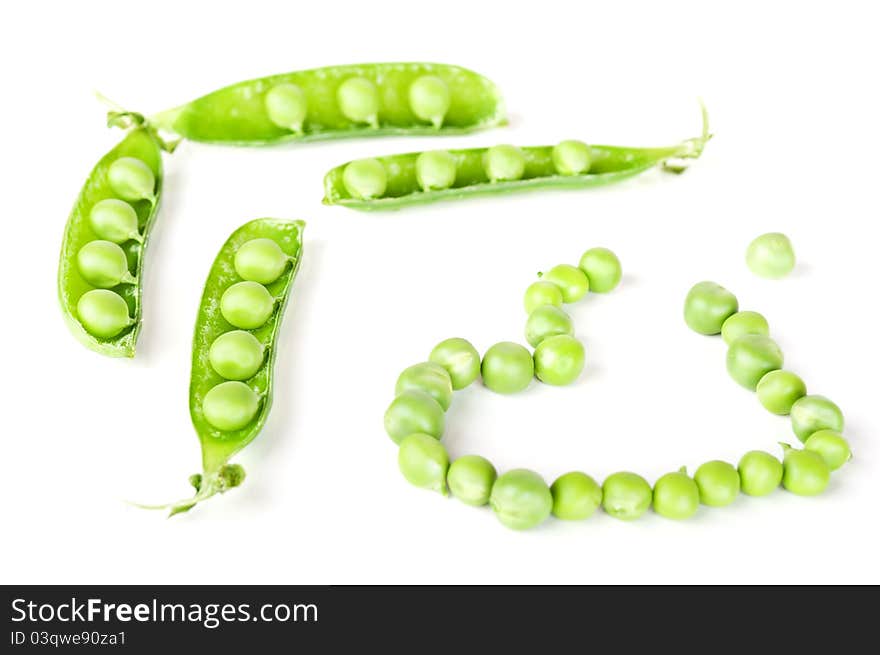 Fresh green peas isolated on a white background