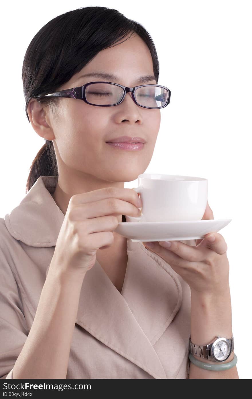 Asian business woman about to enjoy her morning cup of coffee before work isolated. Asian business woman about to enjoy her morning cup of coffee before work isolated