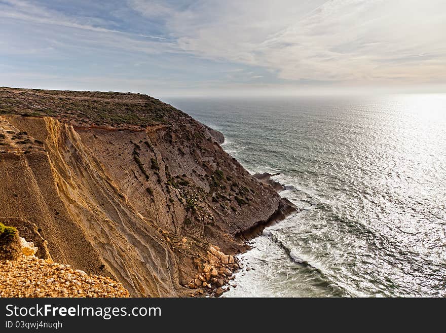 Beautiful cliff over the Atlantic Ocean in region of Sesimbra. Beautiful cliff over the Atlantic Ocean in region of Sesimbra.