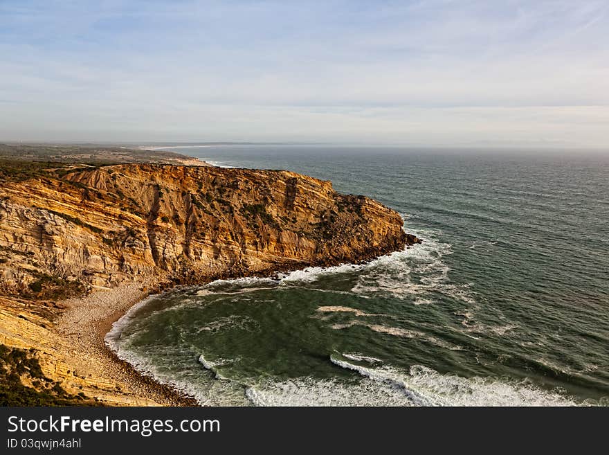 Beautiful cliff over the Atlantic Ocean in region of Sesimbra. Beautiful cliff over the Atlantic Ocean in region of Sesimbra.