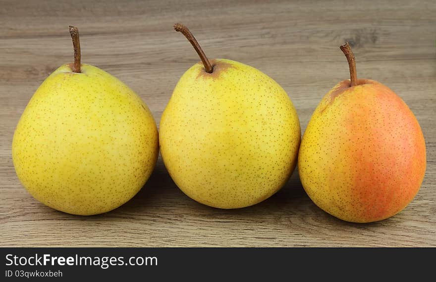 Pears on the wooden table. Pears on the wooden table