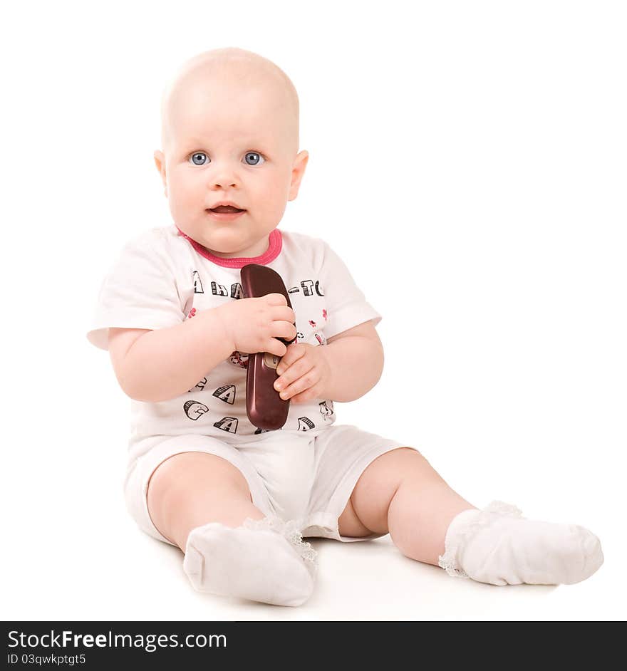 Sweet baby girl holding mobile phone. Isolated over white background. Sweet baby girl holding mobile phone. Isolated over white background