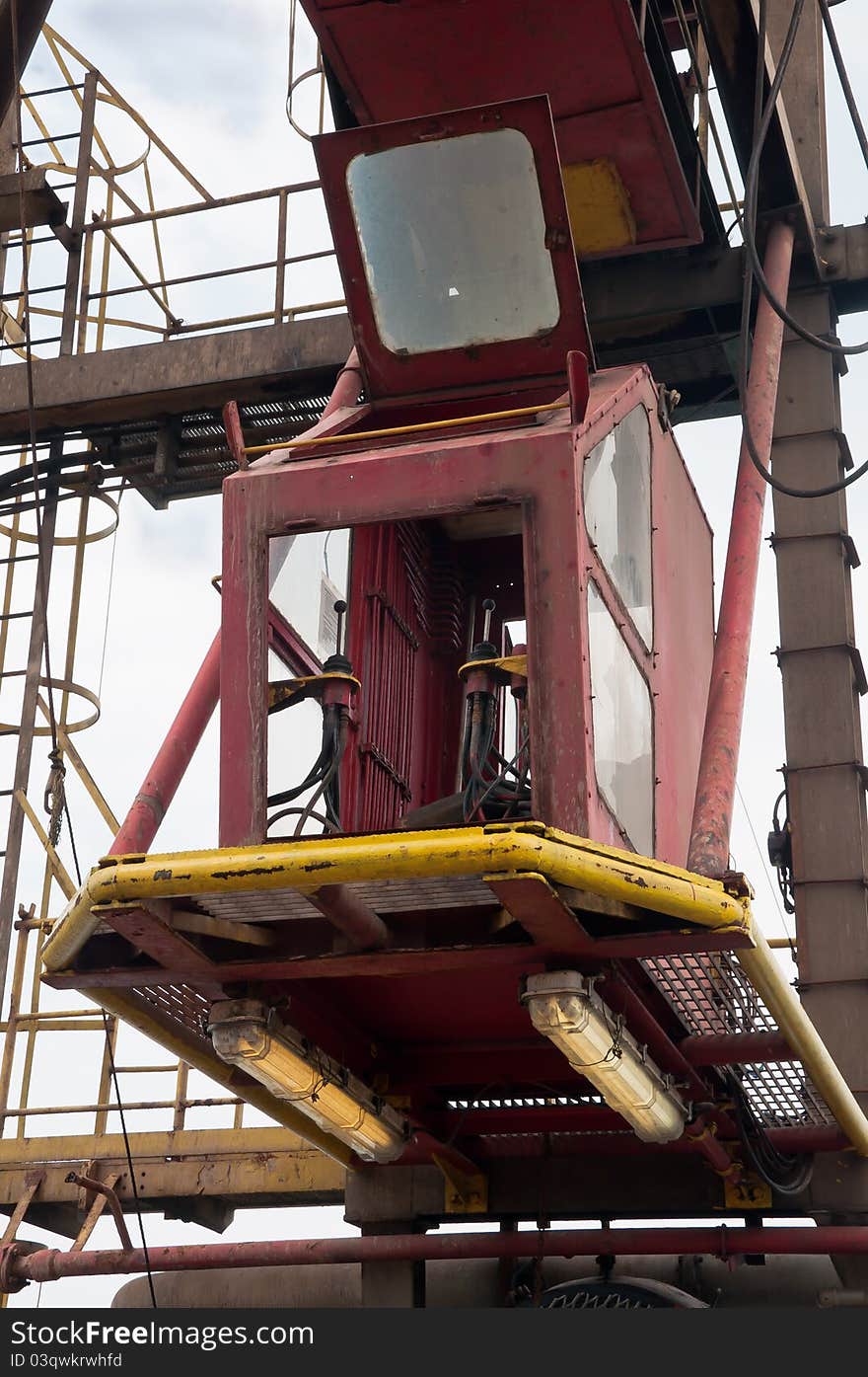 A monkey board for an operator to handle drilling tools on the drill floor.