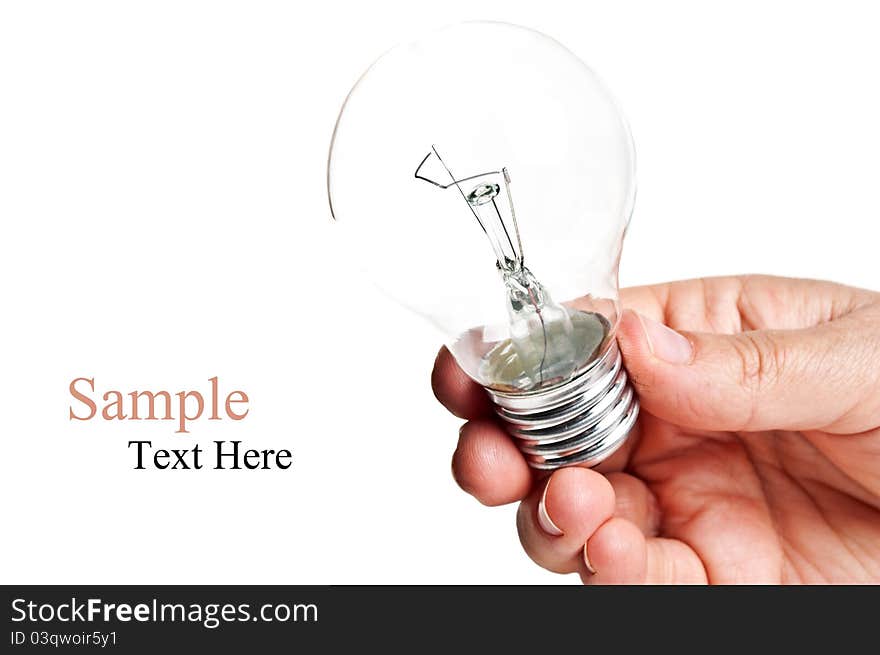 Bulb in hand isolated on a white background