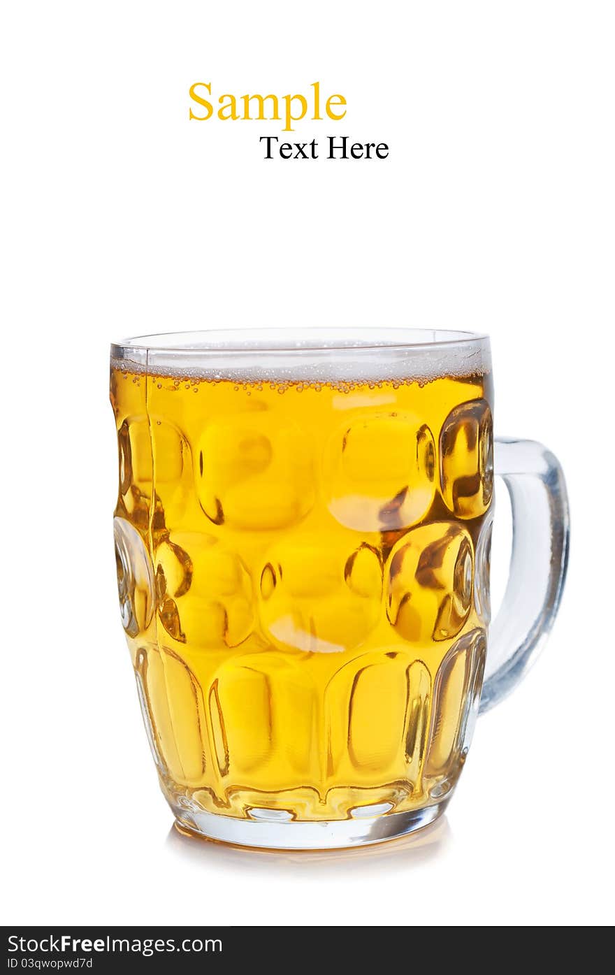 Fresh glass of beer isolated on a white background