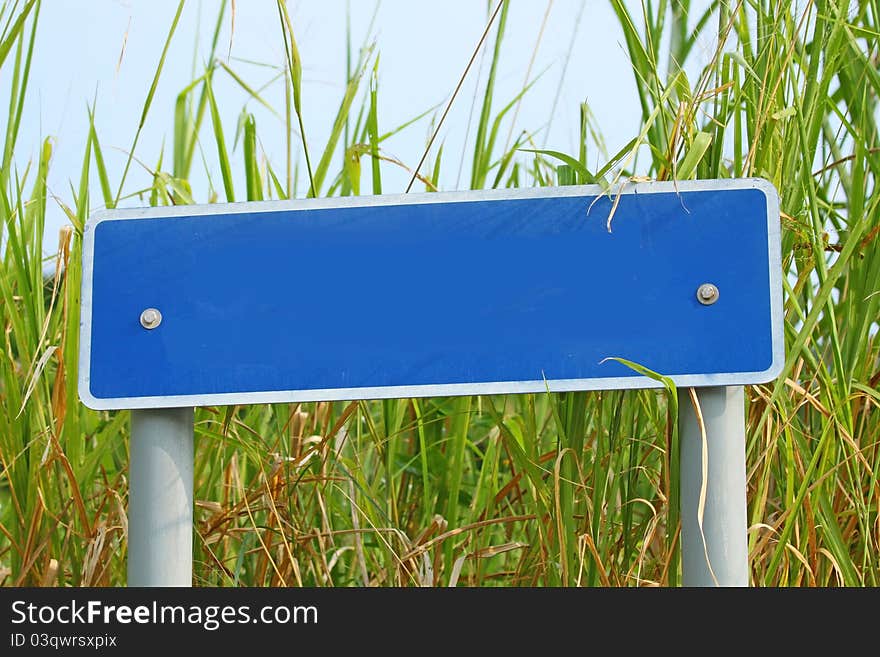 The signage is in blue color. The signage is in blue color.