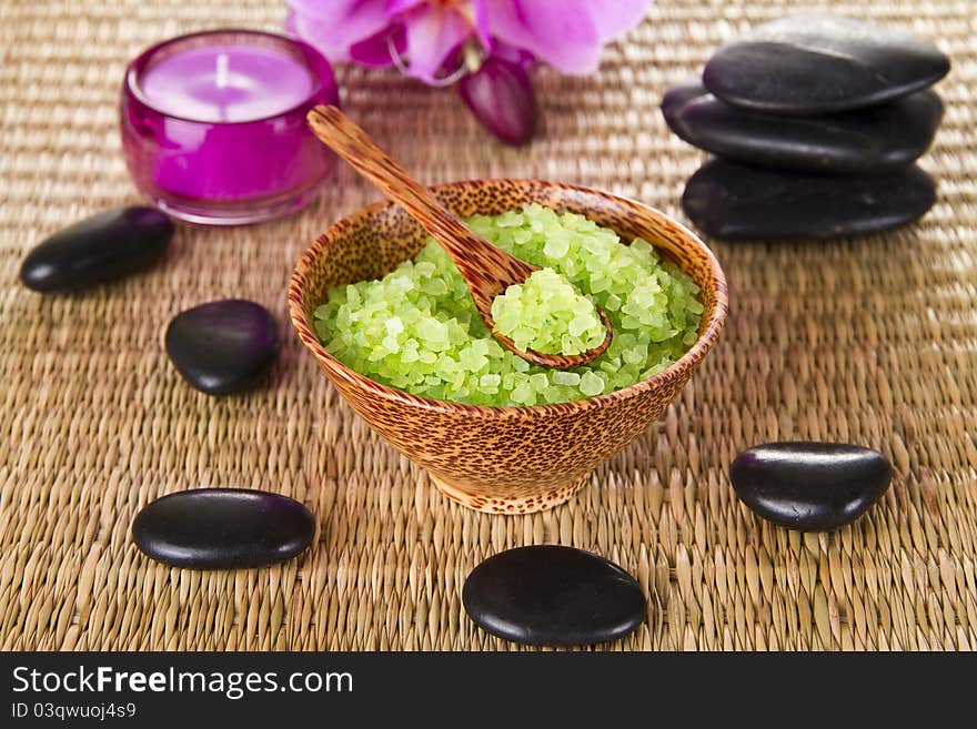 Spa Concept - Zen Stones and Relaxing Salt in Wooden Bowl