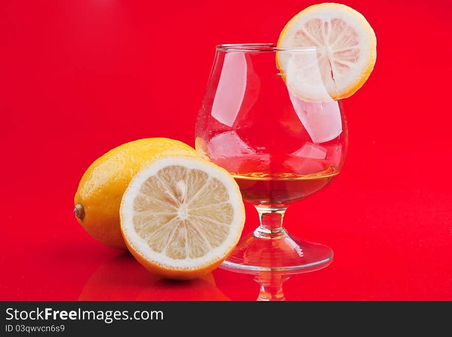 Cognac In A Classic Glass And Lemon