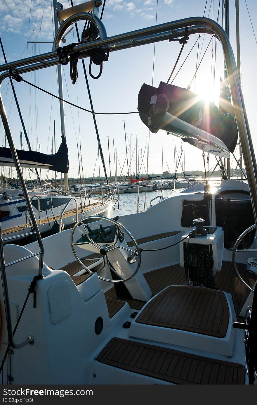 Yachts on an anchor in harbor, boats series