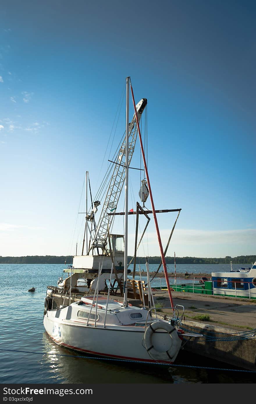 Yachts on an anchor in harbor, boats series