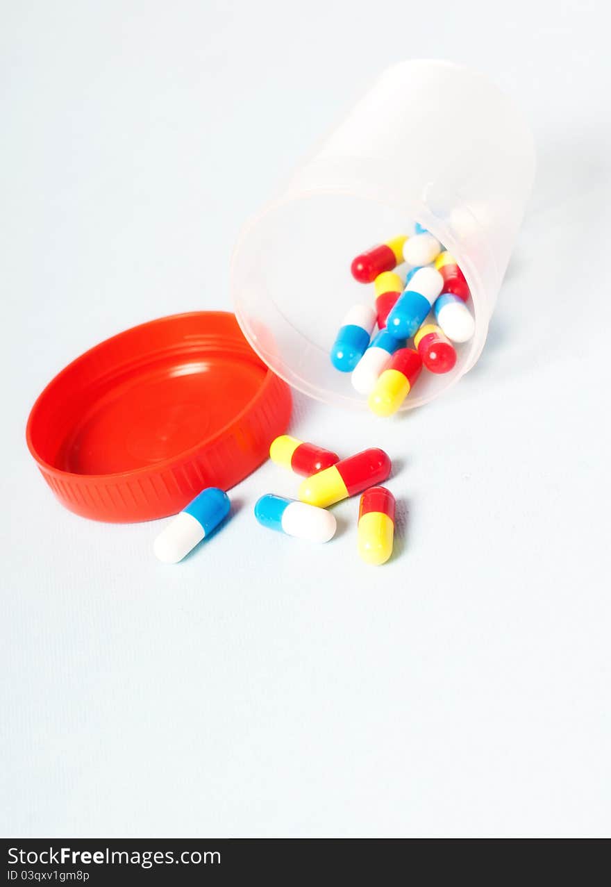 Medical pills on white background