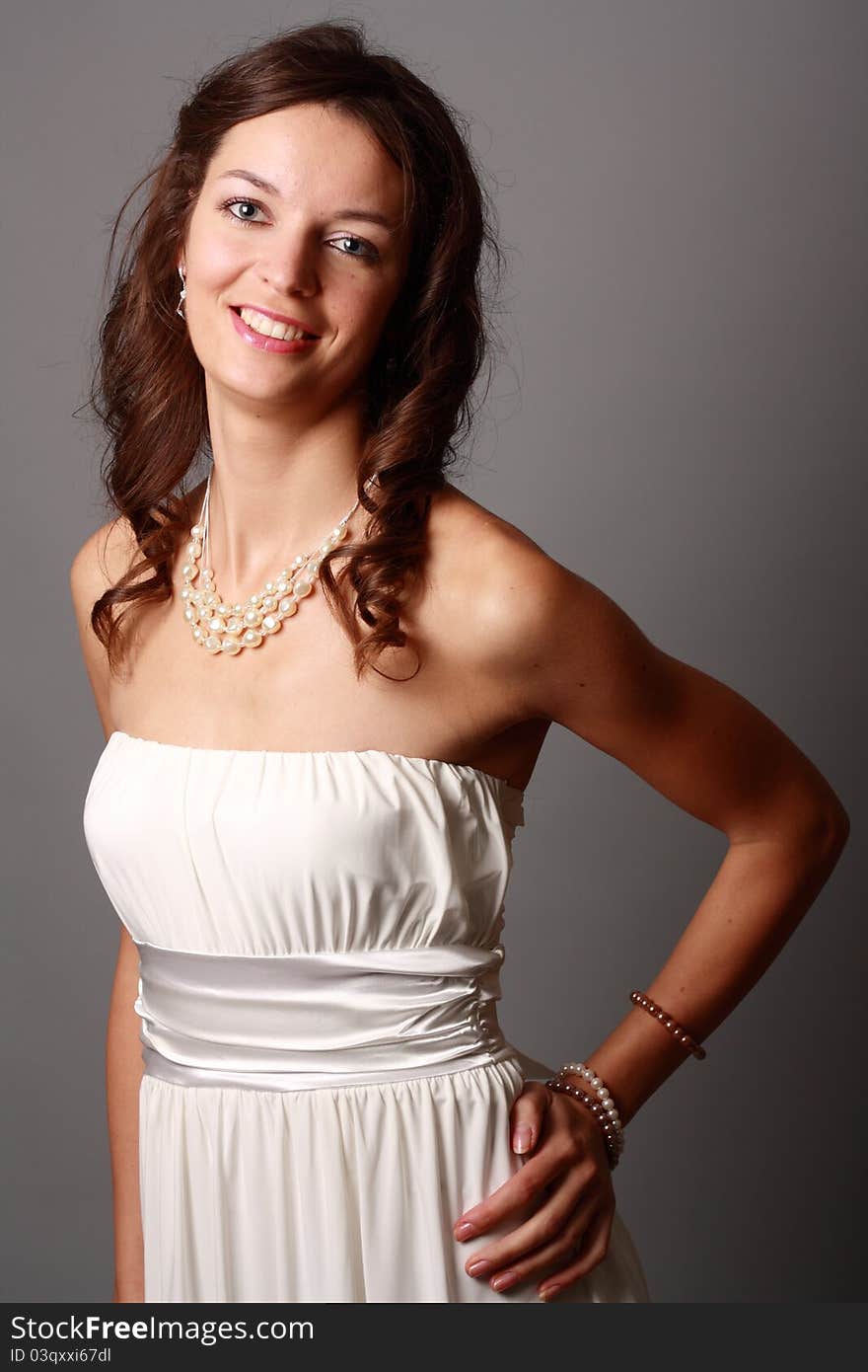 Portrait of a beautiful girl in white dress. Portrait of a beautiful girl in white dress