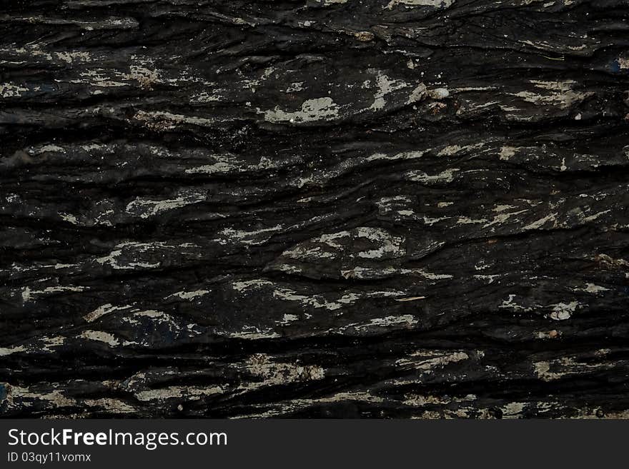 Outdoor black stone wall background