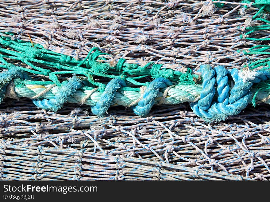 Fishing nets on pier at Burghead harbour, Moray, scotland. Fishing nets on pier at Burghead harbour, Moray, scotland