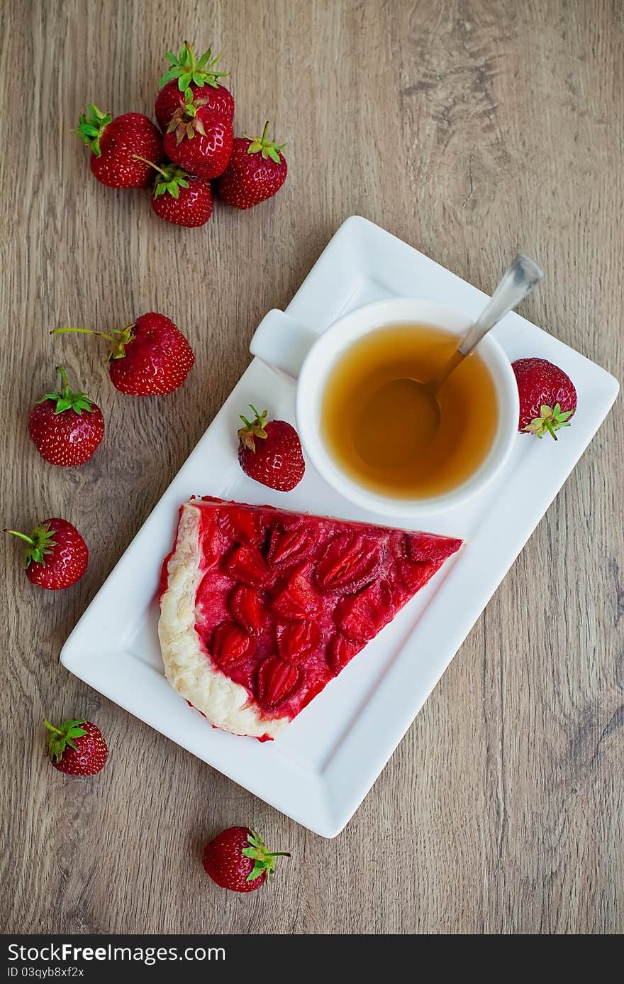 Homemade strawberry pie and a cup of tea. Homemade strawberry pie and a cup of tea