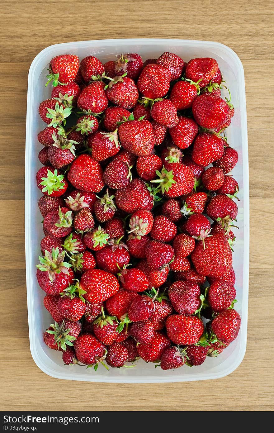 Big heap of strawberries in a bowl