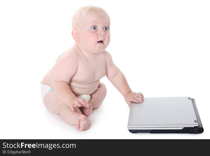 The little baby with the laptop on white