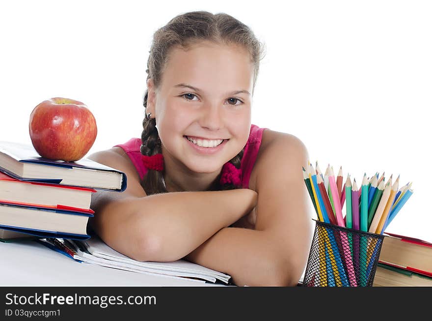 Portrait of the young girl with books