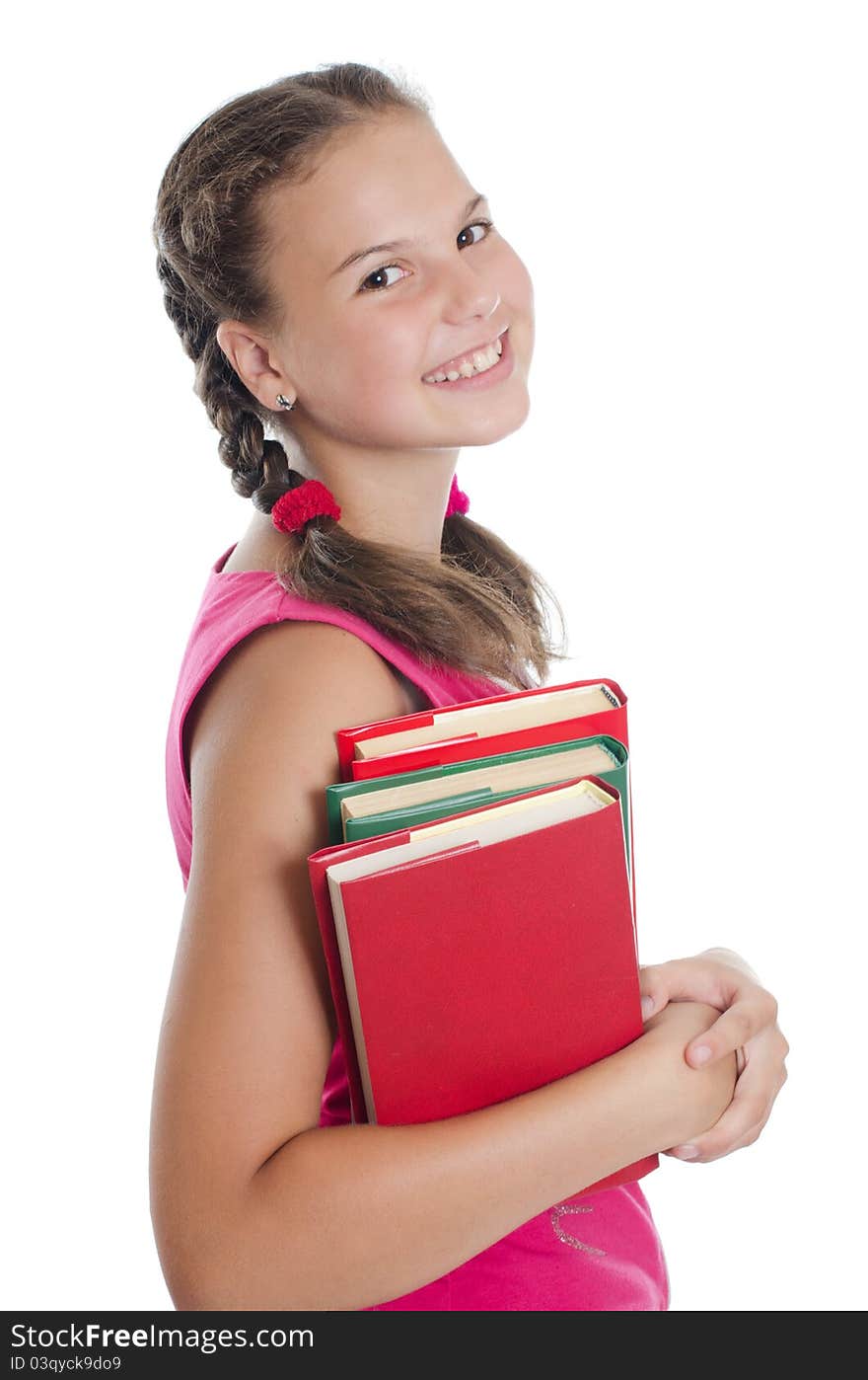 Portrait of the young girl with books