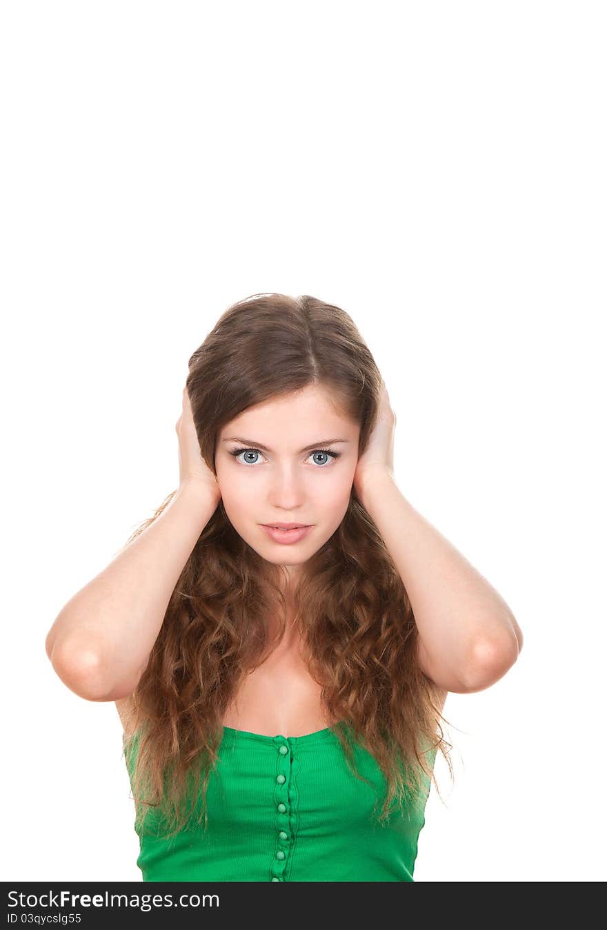 Portrait of attractive teenage girl with hands on ears, isolated over white background