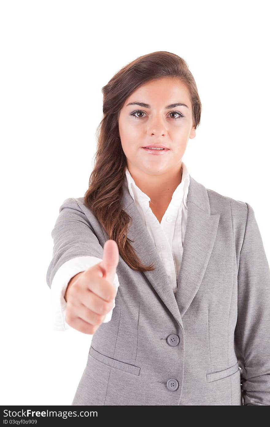 Young business woman showing thumbs up