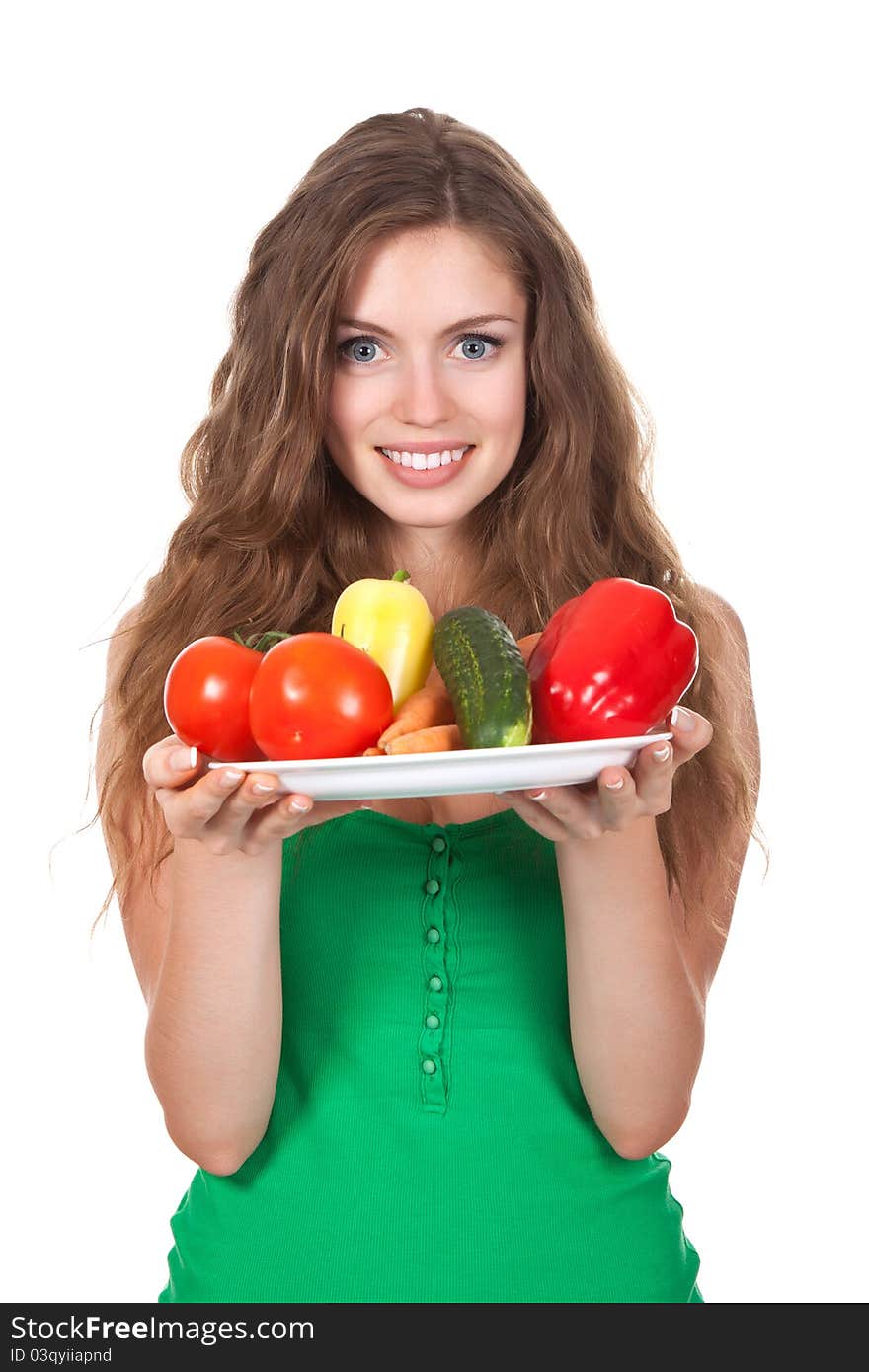 Portrait of young smile beautiful woman eating raw vegetables salad. Portrait of young smile beautiful woman eating raw vegetables salad